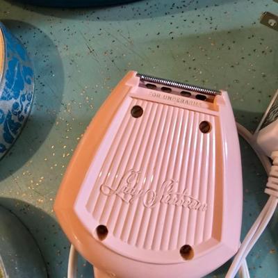 Vintage Lady Dazey Hair dryer, two vintage women's electric razors and vintage foot Massager