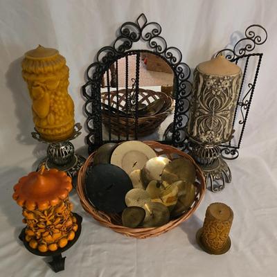 LOT 5: Black Scroll Mirror, Carved Pillar Candles, and Assorted Candle Holders in Basket