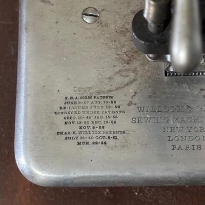 LOT 87: Vintage Wilcox & Gibbs Sewing Machine on Base.