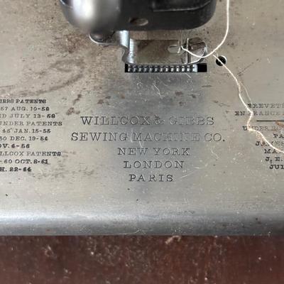 LOT 87: Vintage Wilcox & Gibbs Sewing Machine on Base.