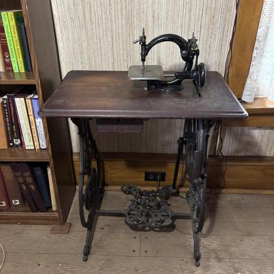 LOT 87: Vintage Wilcox & Gibbs Sewing Machine on Base.