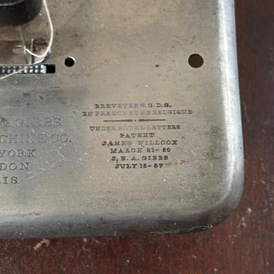 LOT 87: Vintage Wilcox & Gibbs Sewing Machine on Base.