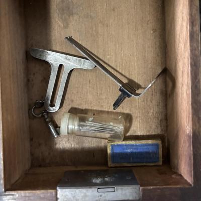 LOT 87: Vintage Wilcox & Gibbs Sewing Machine on Base.