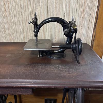 LOT 87: Vintage Wilcox & Gibbs Sewing Machine on Base.