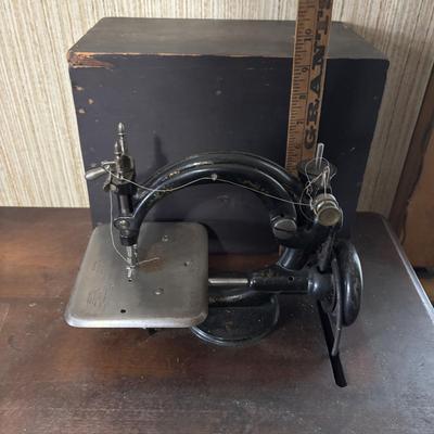 LOT 87: Vintage Wilcox & Gibbs Sewing Machine on Base.