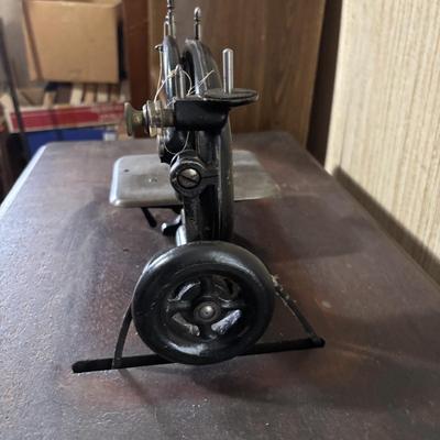 LOT 87: Vintage Wilcox & Gibbs Sewing Machine on Base.