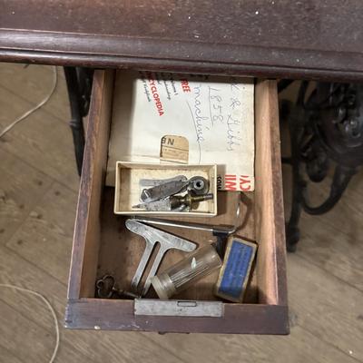 LOT 87: Vintage Wilcox & Gibbs Sewing Machine on Base.