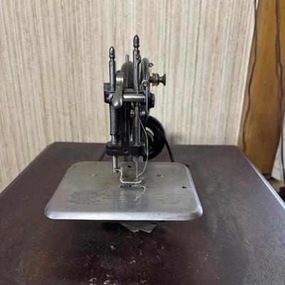 LOT 87: Vintage Wilcox & Gibbs Sewing Machine on Base.