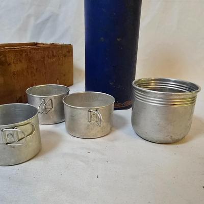 LOT 114: Rubbermaid Cooler, Thermos Picnic Jug, Thermos and UnoVac Vacuum Bottles