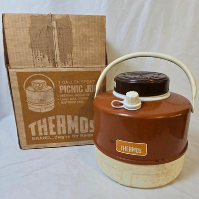 LOT 114: Rubbermaid Cooler, Thermos Picnic Jug, Thermos and UnoVac Vacuum Bottles