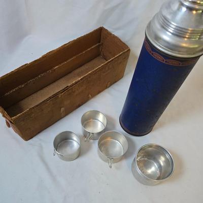 LOT 114: Rubbermaid Cooler, Thermos Picnic Jug, Thermos and UnoVac Vacuum Bottles