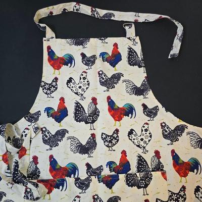 LOT 121: Retro Mushroom Decor with Corning Ware, Pyrex and Milk Glass Mugs, and Aprons