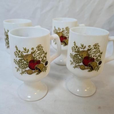 LOT 121: Retro Mushroom Decor with Corning Ware, Pyrex and Milk Glass Mugs, and Aprons