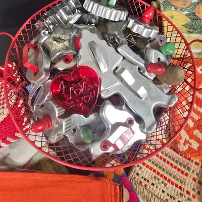 LOT 123: Copper Bundt Pans with Vintage Kitchen Gadgets and Cookie Cutters, Betty Crocker Points, Aprons, Tea Towels and Napkins