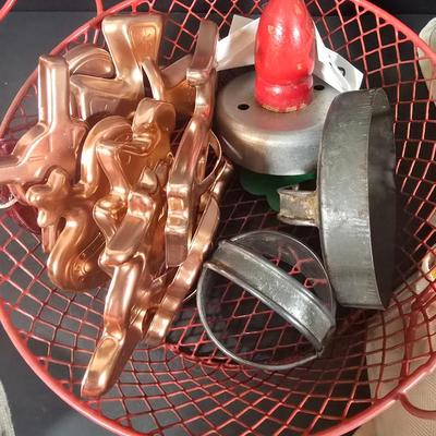 LOT 123: Copper Bundt Pans with Vintage Kitchen Gadgets and Cookie Cutters, Betty Crocker Points, Aprons, Tea Towels and Napkins