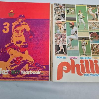 LOT 125: Vintage Phillies Yearbooks, Posters, Ticket Stubs with Pete Rose Newspaper Clipping and Baseball Book