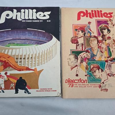 LOT 125: Vintage Phillies Yearbooks, Posters, Ticket Stubs with Pete Rose Newspaper Clipping and Baseball Book