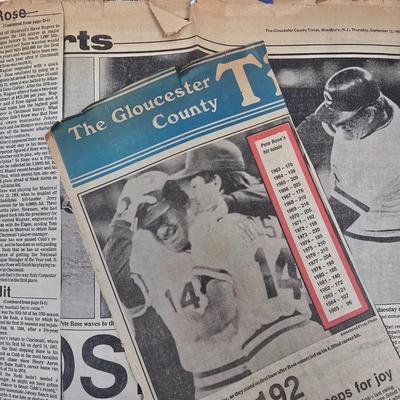 LOT 125: Vintage Phillies Yearbooks, Posters, Ticket Stubs with Pete Rose Newspaper Clipping and Baseball Book