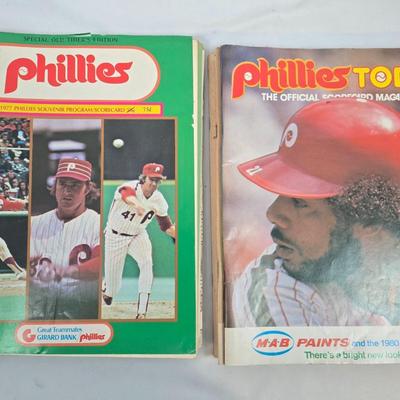 LOT 125: Vintage Phillies Yearbooks, Posters, Ticket Stubs with Pete Rose Newspaper Clipping and Baseball Book
