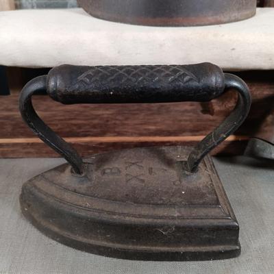 LOT 138: Antique Sad Irons, Metal Washboard, Miniature Ironing Board and Sleeve Ironing Board