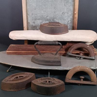 LOT 138: Antique Sad Irons, Metal Washboard, Miniature Ironing Board and Sleeve Ironing Board