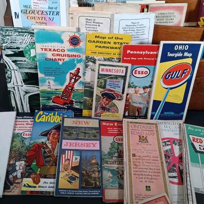 LOT 139: Wooden Magazine Rack with Vintage Travel Maps and Pamphlets