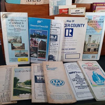 LOT 139: Wooden Magazine Rack with Vintage Travel Maps and Pamphlets