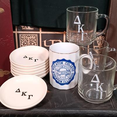 LOT 154: Vintage University and High School - Uniform, Yearbooks, Glassware & More