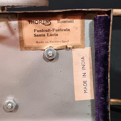 LOT 156: Thorens Swiss Engraved Metal Organ Grinder Music Box
