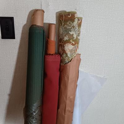 LOT 162: Large Collection of Vintage Fabric Remnants, Bolts of Upholstery and Pleather Fabric, Ribbons, Patterns & More