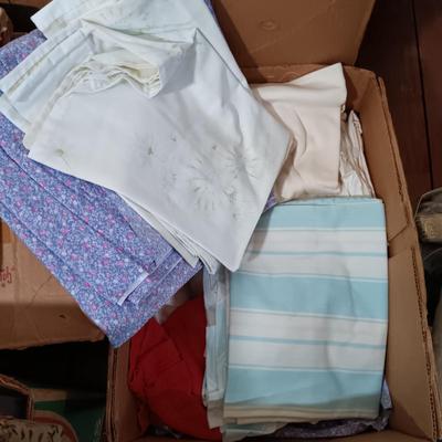 LOT 162: Large Collection of Vintage Fabric Remnants, Bolts of Upholstery and Pleather Fabric, Ribbons, Patterns & More
