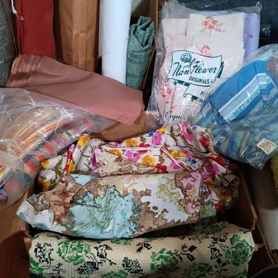 LOT 162: Large Collection of Vintage Fabric Remnants, Bolts of Upholstery and Pleather Fabric, Ribbons, Patterns & More