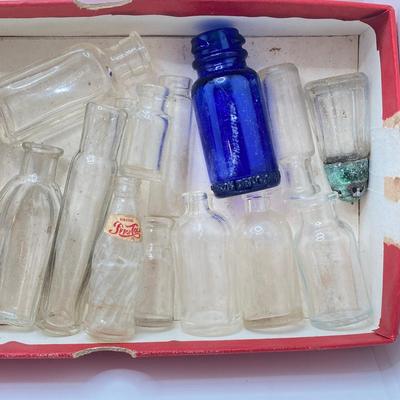 LOT 184: Collection of Vintage / Antique Miniature Glass Bottles, Oil Cans, Black Pantry Tin and More