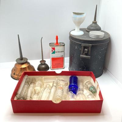 LOT 184: Collection of Vintage / Antique Miniature Glass Bottles, Oil Cans, Black Pantry Tin and More