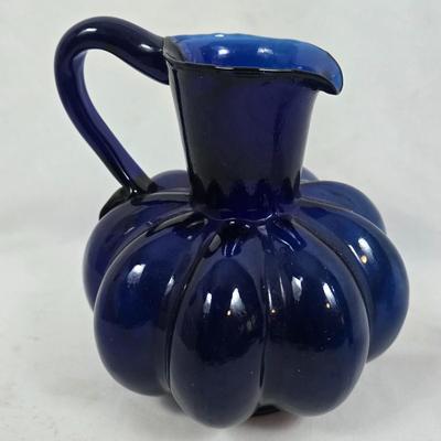 LOT 191: Colbalt Blue Glass Collection: Pitcher, Candlesticks, Plate and Vases