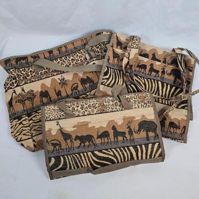 LOT 201: Safari Print Carpet Bags