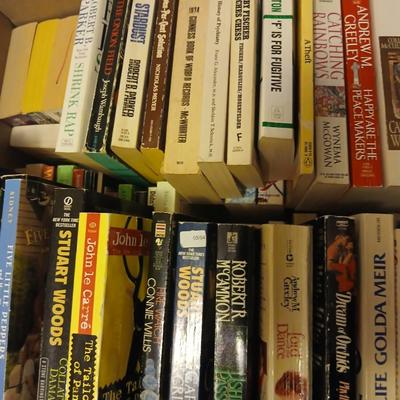 Large assortment of paperback books - Stuart Woods - Robert Parker - Connie Willis Lots of winter reading!