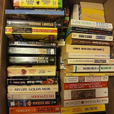 Large assortment of paperback books - Stuart Woods - Robert Parker - Connie Willis Lots of winter reading!