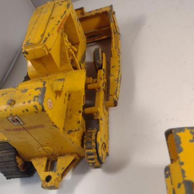 Pair of Vintage Cast Metal International Harvester Tractors