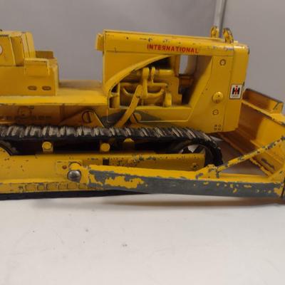 Pair of Vintage Cast Metal International Harvester Tractors
