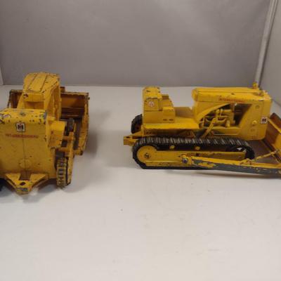Pair of Vintage Cast Metal International Harvester Tractors