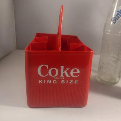 Plastic Coca-Cola Carrier and Assorted Bottles
