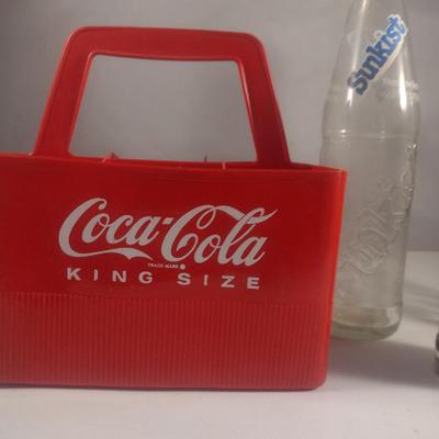 Plastic Coca-Cola Carrier and Assorted Bottles