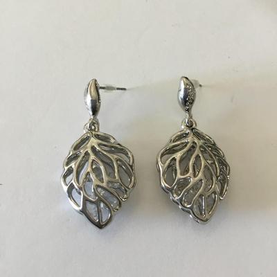 Beautiful silver tone hollow leaf dangle earrings