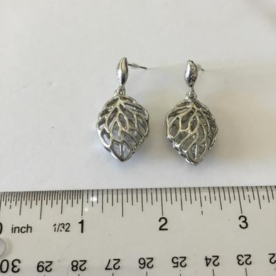 Beautiful silver tone hollow leaf dangle earrings