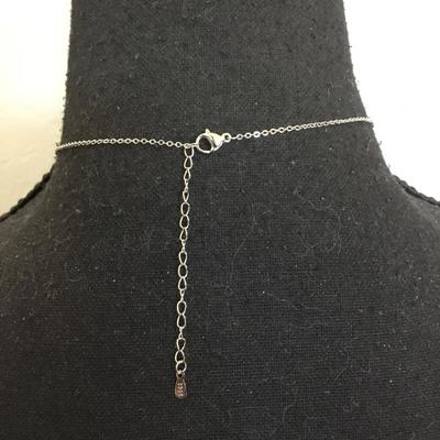 Beautiful 925 sterling silver crystal articulating, Dimond Center pendant necklace very pretty