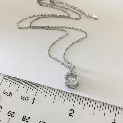 Beautiful 925 sterling silver crystal articulating, Dimond Center pendant necklace very pretty