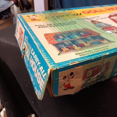 WALT DISNEY PRODUCTIONS CARRY-ALL DOLL HOUSE BY MARX