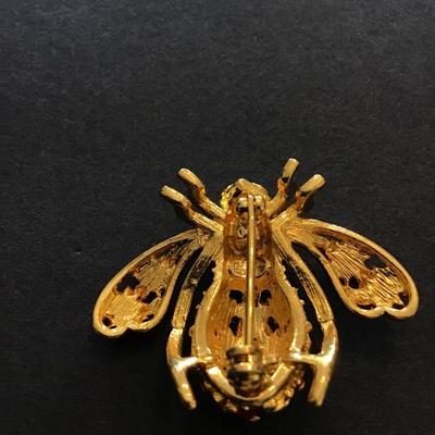 Rare Joan Rivers poinsettia bee pin