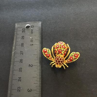 Rare Joan Rivers poinsettia bee pin